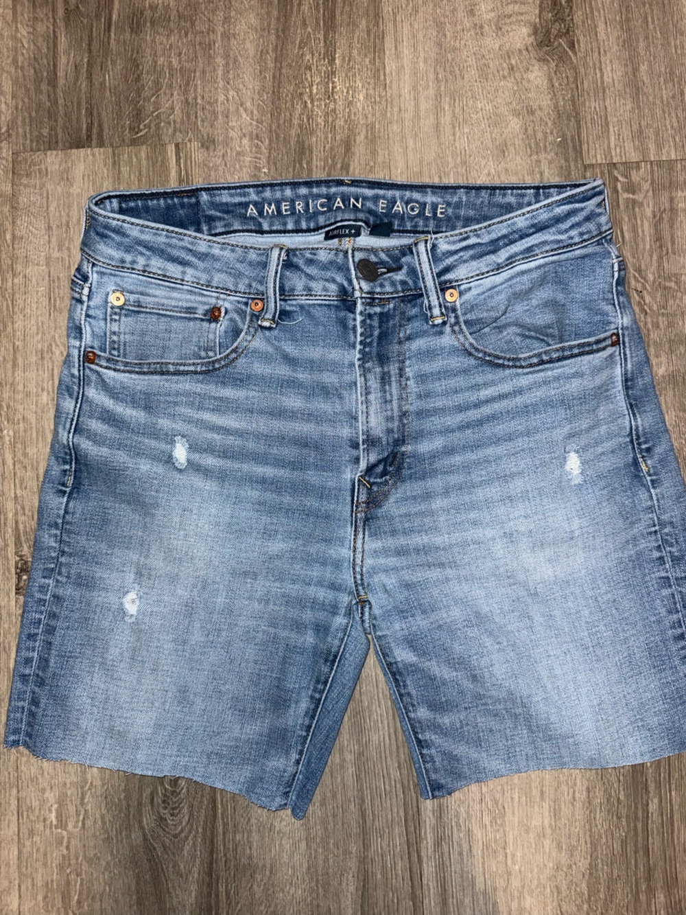 American Eagle Outfitters Faded Light Blue Slim Straight Jeans (cropped)